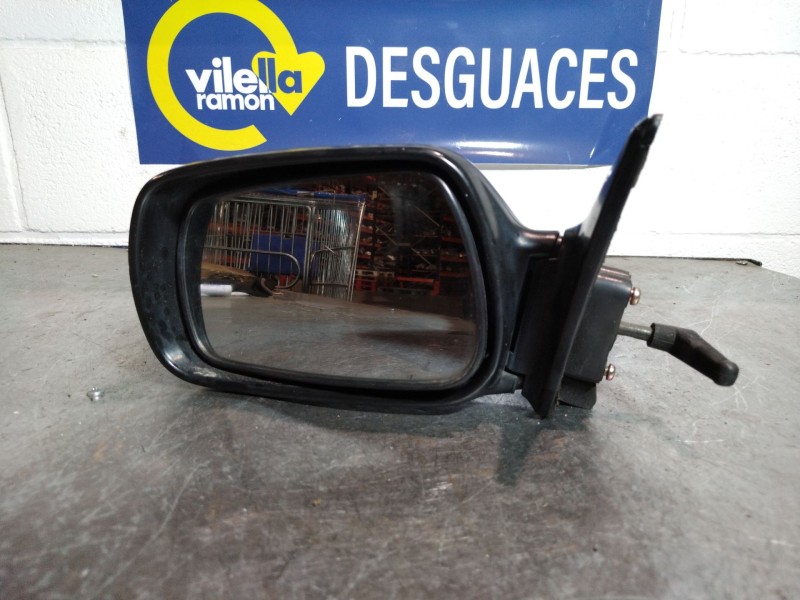 Recambio de retrovisor izquierdo para toyota corolla referencia OEM IAM MANUAL  