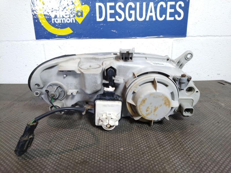 Recambio de faro izquierdo para kia sephia referencia OEM IAM    Recambio de faro izquierdo para kia sephia referencia OEM IAM