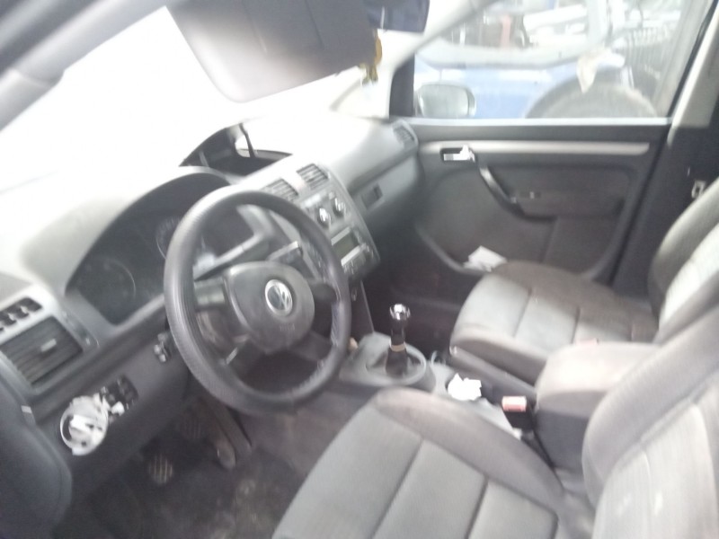 volkswagen touran (1t1)  | 0.03 - 0.06 del año 2004