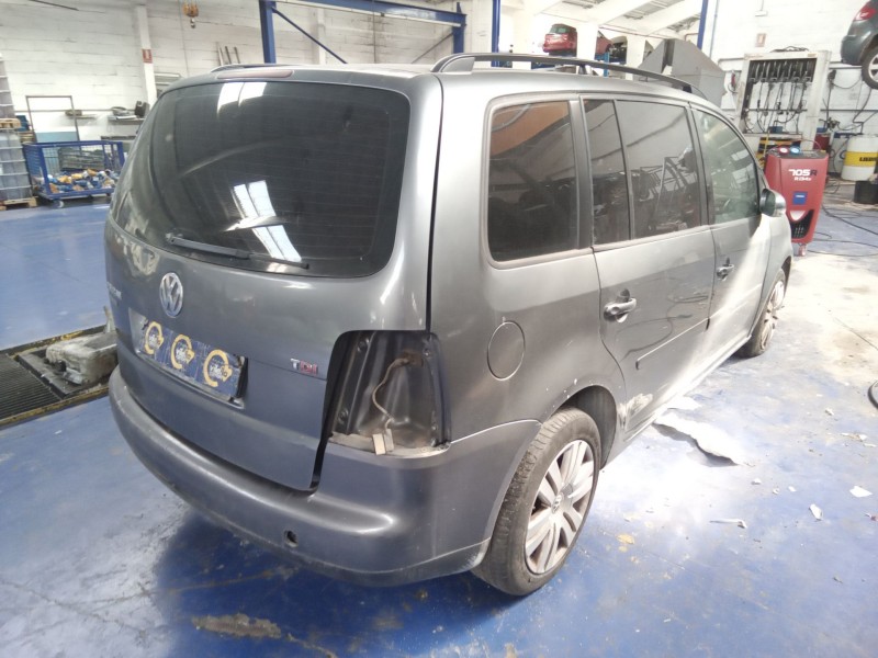 volkswagen touran (1t1)  | 0.03 - 0.06 del año 2004