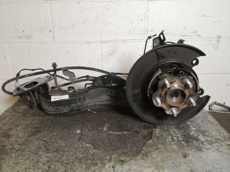 Recambio de mangueta trasera izquierda con brazo para nissan qashqai (j10) acenta referencia OEM IAM   