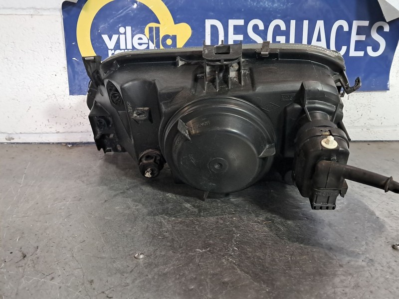 Recambio de faro derecho para renault megane europa 1.6e 75 referencia OEM IAM   