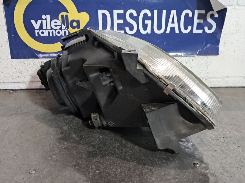 Recambio de faro izquierdo para renault megane europa 1.6e 75 referencia OEM IAM   