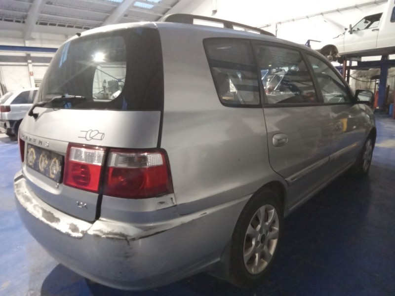 kia carens  | 0.03 - 0.06 del año 2004