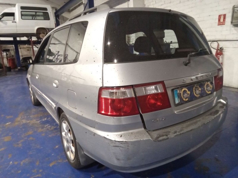 kia carens  | 0.03 - 0.06 del año 2004