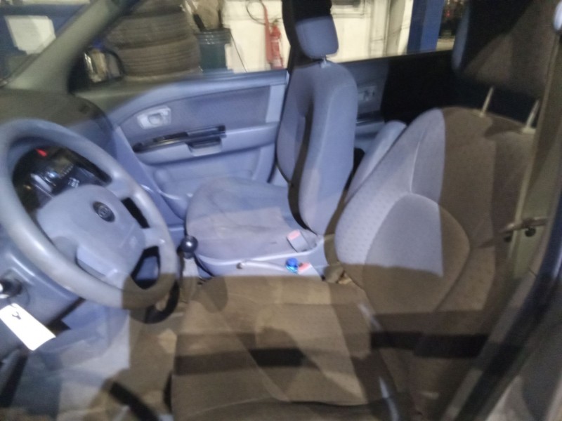 kia carens  | 0.03 - 0.06 del año 2004