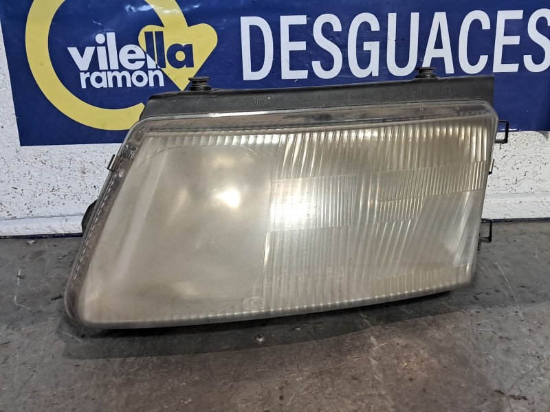 Recambio de faro izquierdo para volkswagen passat berlina (3b2) 1.9 tdi referencia OEM IAM hella  