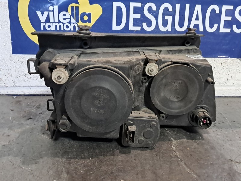 Recambio de faro izquierdo para volkswagen passat berlina (3b2) 1.9 tdi referencia OEM IAM hella  